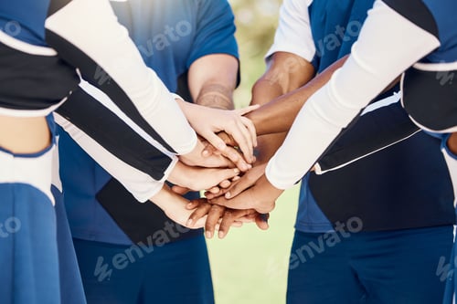 Preview: Hands, teamwork and motivation with cheerleaders in a huddle for support during a sports game or co