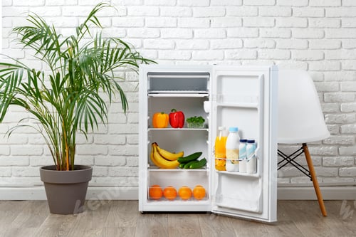 Preview: Open White Refrigerator With Food and Drinks in Modern Kitchen