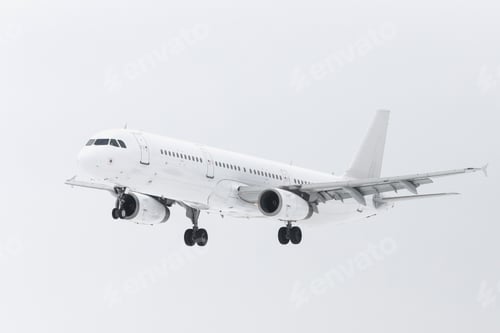 Preview: White plane with chassis in the sky, landing mode. Passenger airplane flight