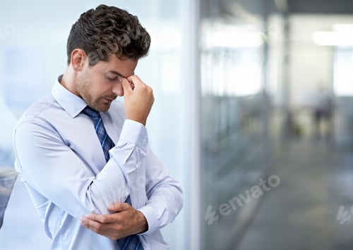 Preview: The pressure is just crazy. A young businessman looking stressed-out at the office.