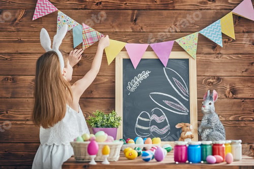 Preview: child painting eggs