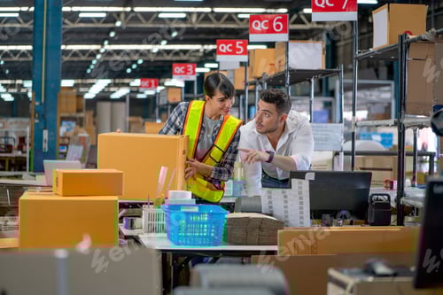 Preview: Two Cacuasian warehouse workers help to work for packing and delivery the product in part of qc