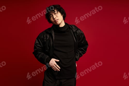 Preview: Urban zenith asian model presents sartorial elegance in studio setting