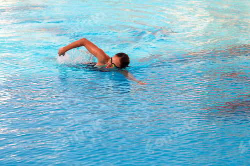 Preview: The girl swims in the pool in crawl style