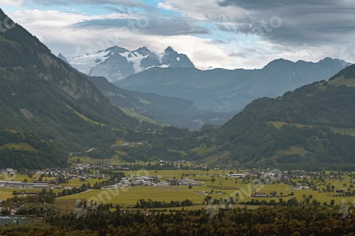 Preview: Beautiful, Stunning Landscape view of Mountain Village with Lauterbrunnen Valley