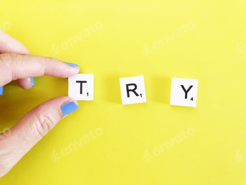 Try: Colorful Letter Tiles Spelling the Word