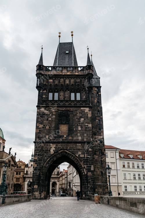 Preview: Old Town Bridge Tower in Charles Bridge in Prague against sky at sunrise. Czech Republic.