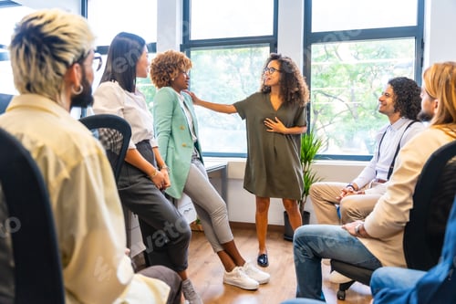 Preview: Woman advising a colleague in a coworking