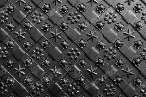 Preview: Black forged door, rhombus symmetrical texture. Grunge black background