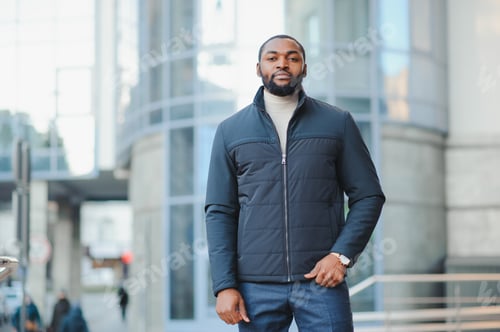 Preview: African American man in stylish new clothes on the street