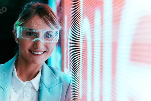 Preview: business woman with cyborg bionic arm and augmented reality visor.