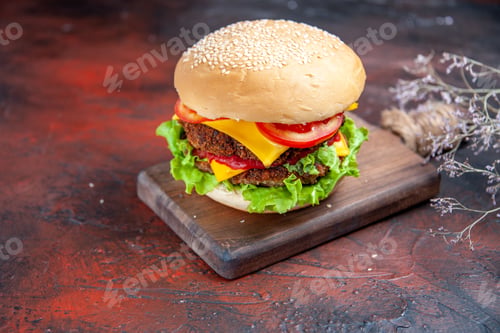 Preview: front view meat burger with cheese salad and tomatoes on a dark background meal bun sandwich