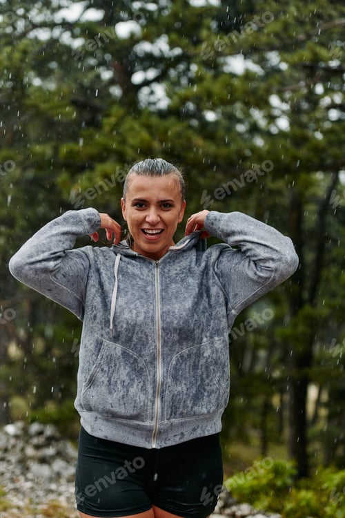 Preview: Beautiful Woman Enjoying Rainy Day After Intense Run