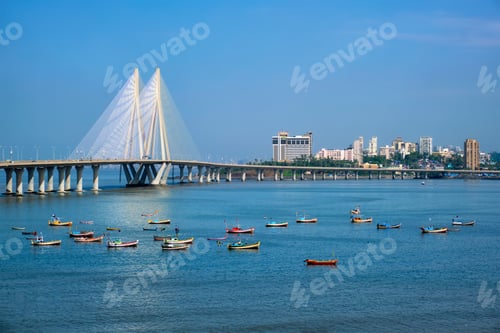 Preview: Bandra - Worli Sea Link bridge with fishing boats view from Bandra fort. Mumbai, India