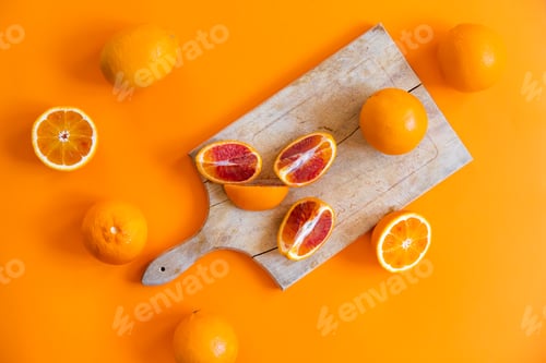 Preview: Fresh juicy oranges on colorful background