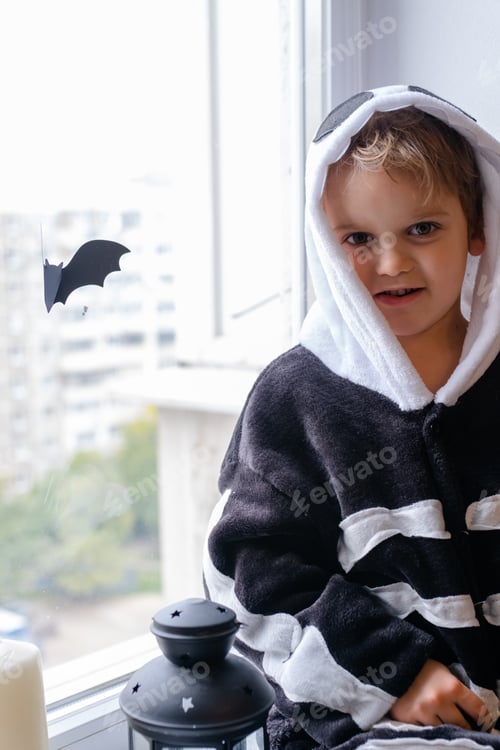 Preview: Young Child by Window in Striped Robe