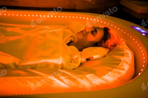 Preview: Caring about beauty, body wraps, hot spa capsule in spa salon.
