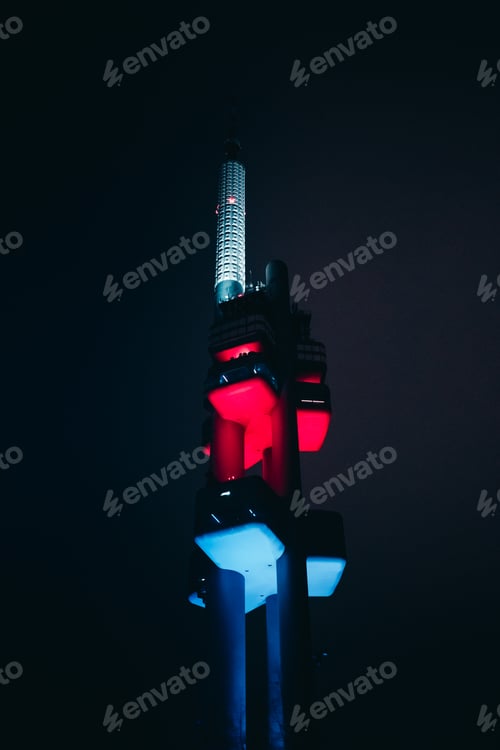Preview: Red And Blue Zizkov Television Tower At Night In Prague