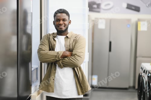 Preview: Customer choosing fridge in appliances store
