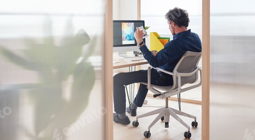 Preview: Businessman using computer graphic designer brainstorming creative ideas for magazine on screen sit
