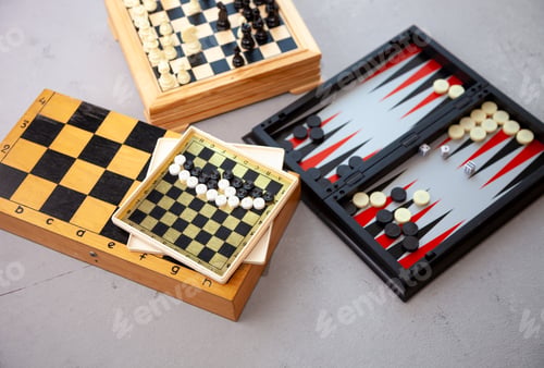 Preview: Board games on the table. Chess, backgammon, checkers. Boards are laid out for the game. Play, have