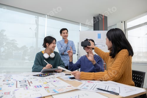 Preview: The program developer team held a brainstorming meeting to design and develop software for smart VR