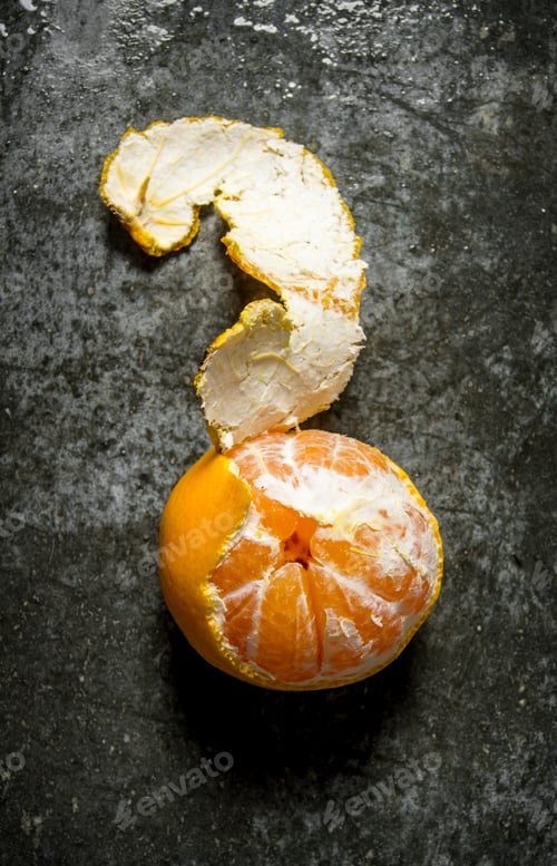 Preview: Fresh tangerines with peel. On stone background.