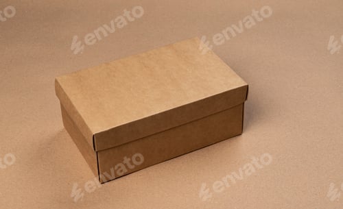 Preview: Brown cardboard box on craft paper background