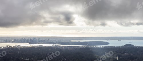 Preview: Aerial View of modern Downtown City during a sunny and cloudy day