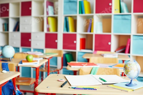 Preview: Classroom Scene with Desks and Colorful Bookcase