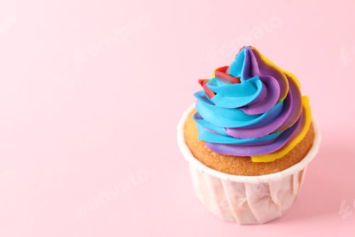 Preview: Colorful Frosted Cupcake on a Light Pink Background