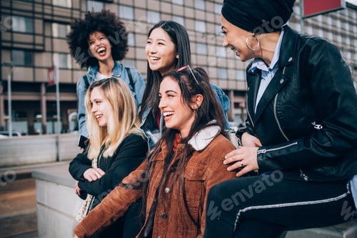 Preview: Group of friends laughing in street, Milan, Italy