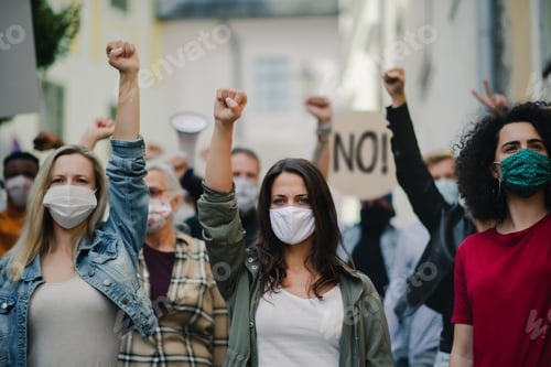 Preview: Group of people activists protesting on streets, women march and demonstration concept.