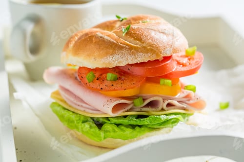 Preview: Big sandwich with fresh ingredients for breakfast