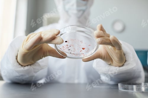 Preview: Scientist Experimenting with Blood Tests