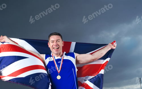 Preview: athlete cheering with U.K. flag and medal