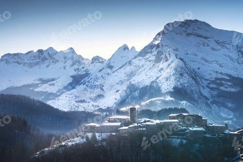 Preview: Snowy village and Apuan mountains in winter. Nicciano, Garfagnana, Tuscany, Italy