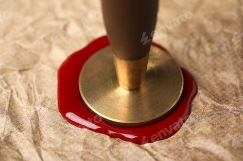 Preview: Sealing crumpled paper with wax stamp, closeup