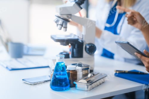 Preview: Young African American and Russian women scientists collaborate, analyzing blood, viruses