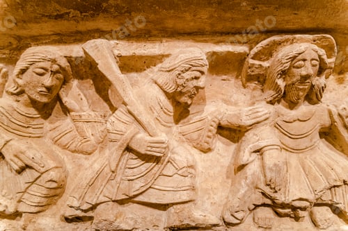 Preview: Detail of religious sculptures carved in medieval stone in the castle of Bari