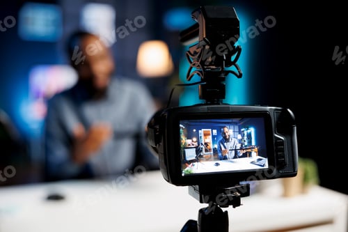 Preview: Man on Camera Screen With Out of Focus Background