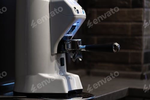 Preview: Close-up part of a coffee machine, a holder for coffee.