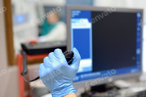Preview: Radiologist is going to take X ray of patient in X-ray room of modern clinic.