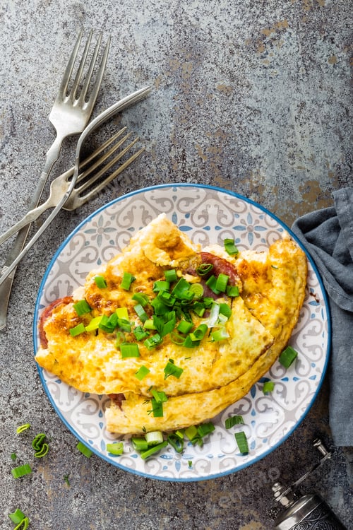 Preview: Omelet or omelette with fresh green onion, scrambled eggs