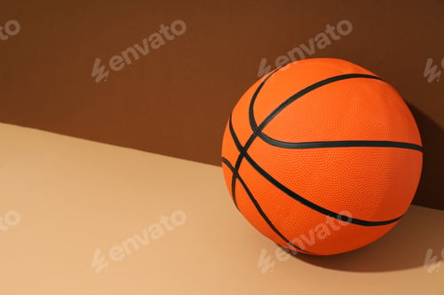 Preview: A basketball ball on a brown background
