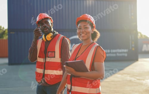 Preview: Foreman checking containers in the terminal, at import and export business logistic company.