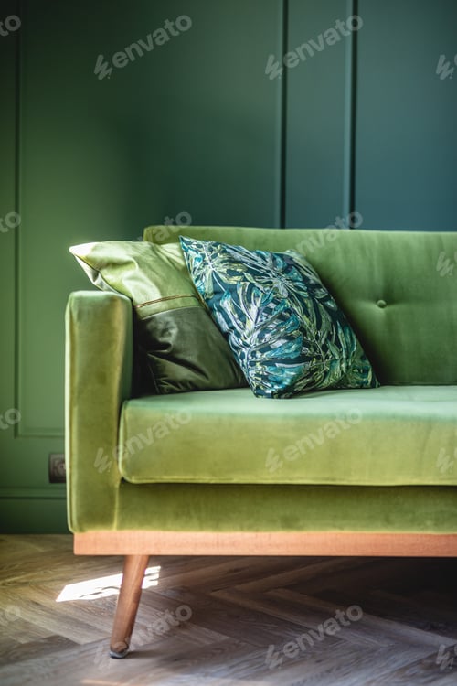 Preview: Green sofa in elegant apartment. Home staging