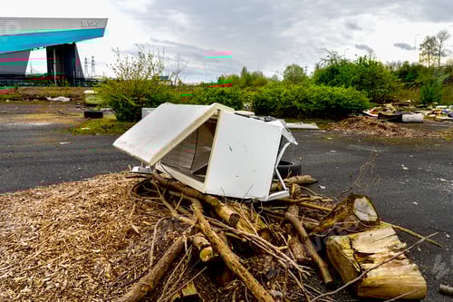 Preview: Fly tipping, rubbish dumped illegally by the road side. refrigerator freezer and garden waste.