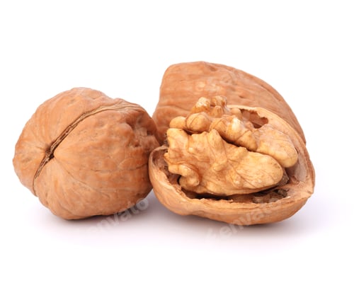 Cracked Walnuts Showing Healthy Kernels on White Background