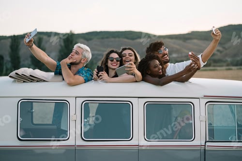 Preview: Friends taking selfie in van